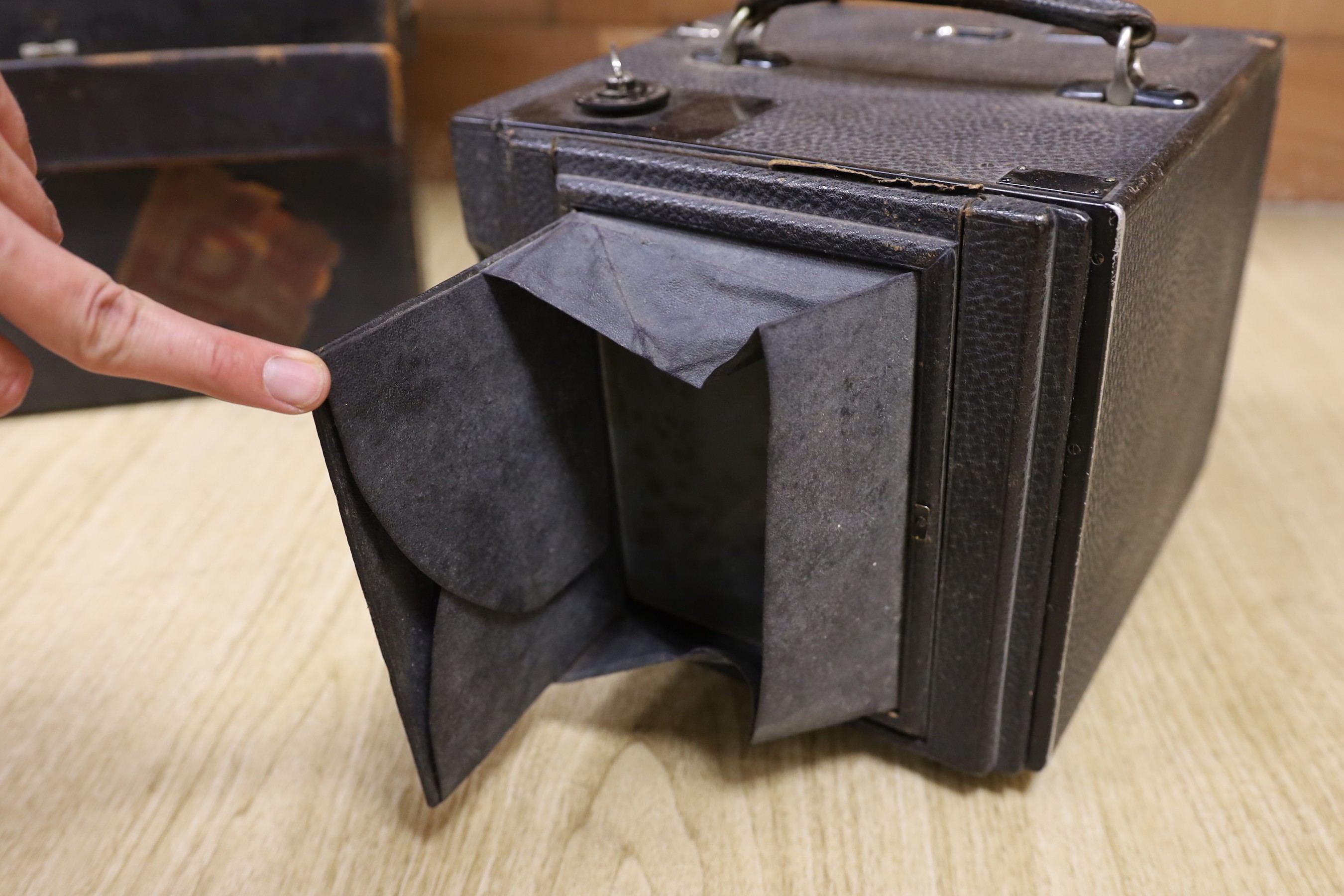 An early 20th century Royal Engineer's cased plate camera and plates